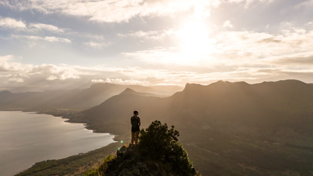 Scenic volcanic hills in Mauritius including Le Morne Brabant, Le Pouce, and Lion Mountain overlooking lagoons and coastline