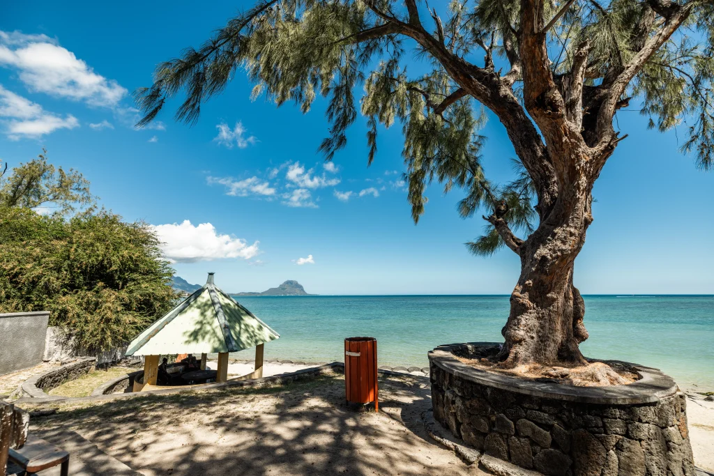 Why should you visit Cap Malheureux when in North Mauritius featuring the iconic red-roof church, turquoise lagoon, and views of Coin de Mire.
